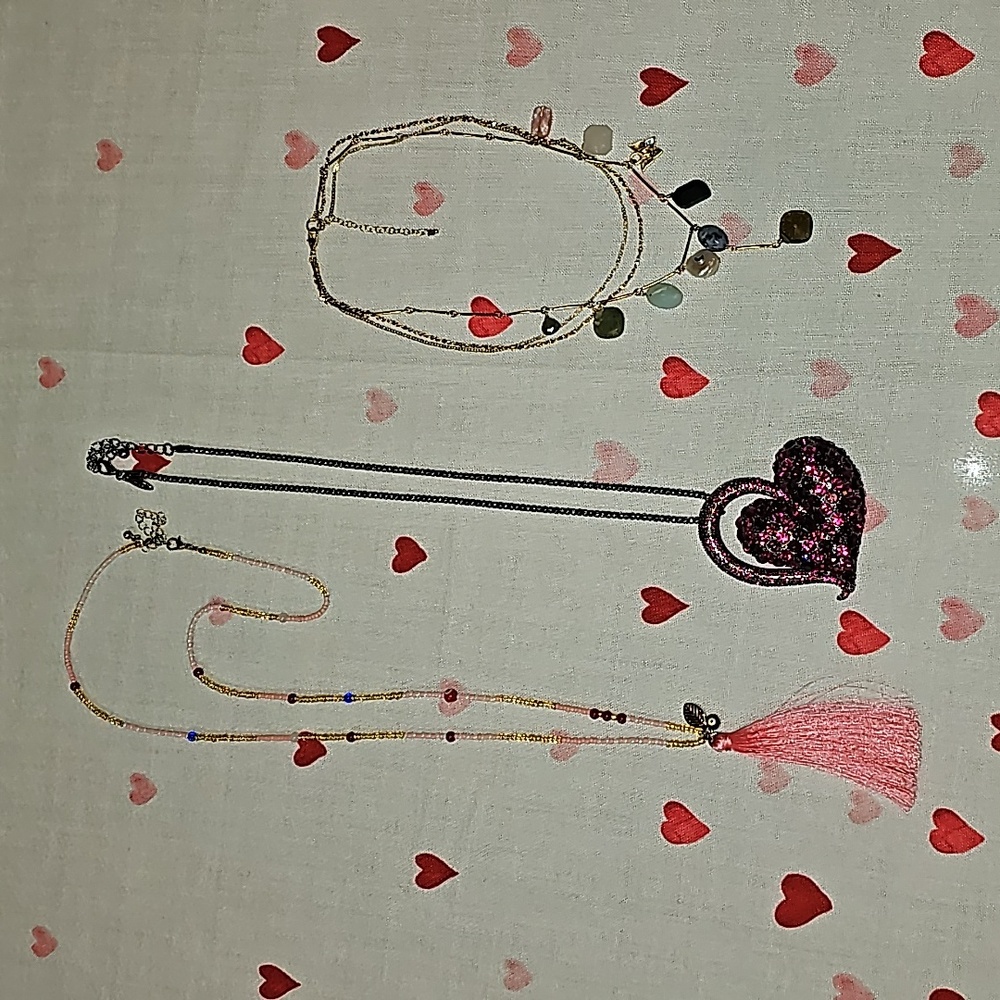 One Betsey Johnson and two Lucky necklaces in this bundle.